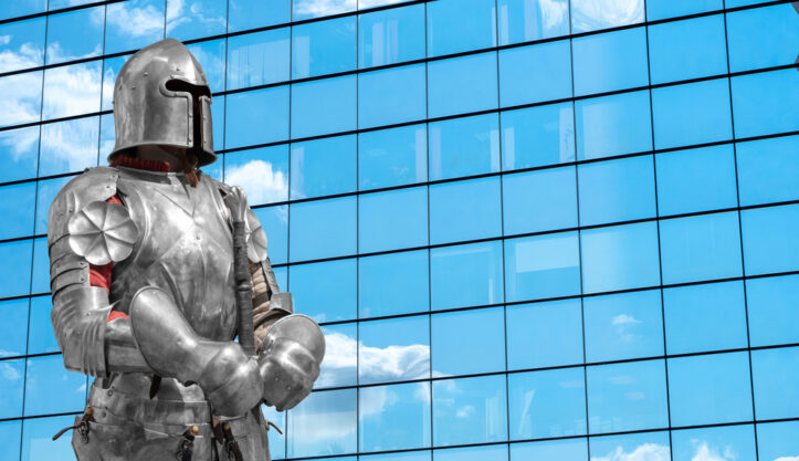 Caring Virginia criminal lawyers strategize with fellow lawyers- Image of knight