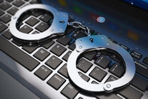 Virginia cybercrime lawyer- Image of handcuffs on keyboard