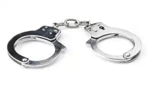 Cracks in police teflon are here to increase says Fairfax criminal lawyer - Picture of Handcuffs