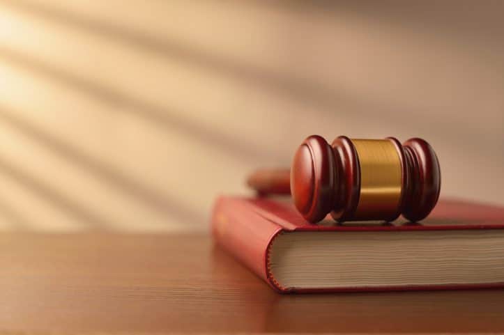 Virginia statutory interpretation for criminal defense - Image of gavel and lawbook