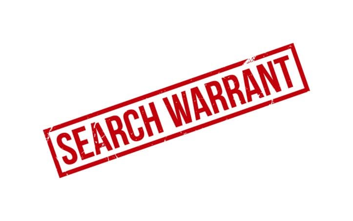 Harsh child pornography laws- Fairfax criminal lawyer cautions- Image of search warrant banner