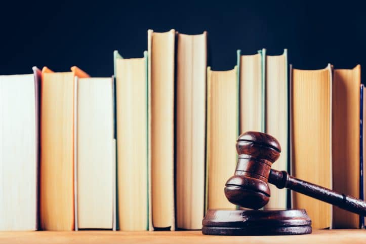 Judicial action- Image of judicial gavel and books