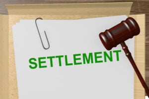 Settling Virginia criminal cases- Fairfax lawyer comments- Image of word settlement