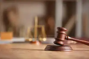 Tandem assault & protective order Virginia cases- Defend fully- Image of gavel