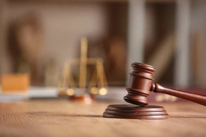 Tandem assault & protective order Virginia cases- Defend fully- Image of gavel