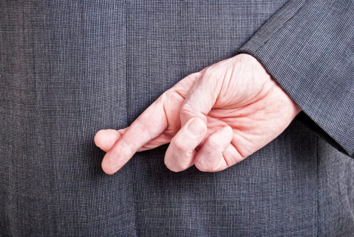 Untruths in your DWI case- Fairfax DUI lawyer comments- Image of finger crossing